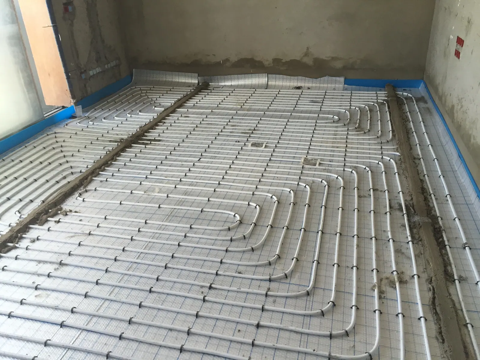 Floor heating pipe laid across a residential building floor in Achrafieh, Beirut
